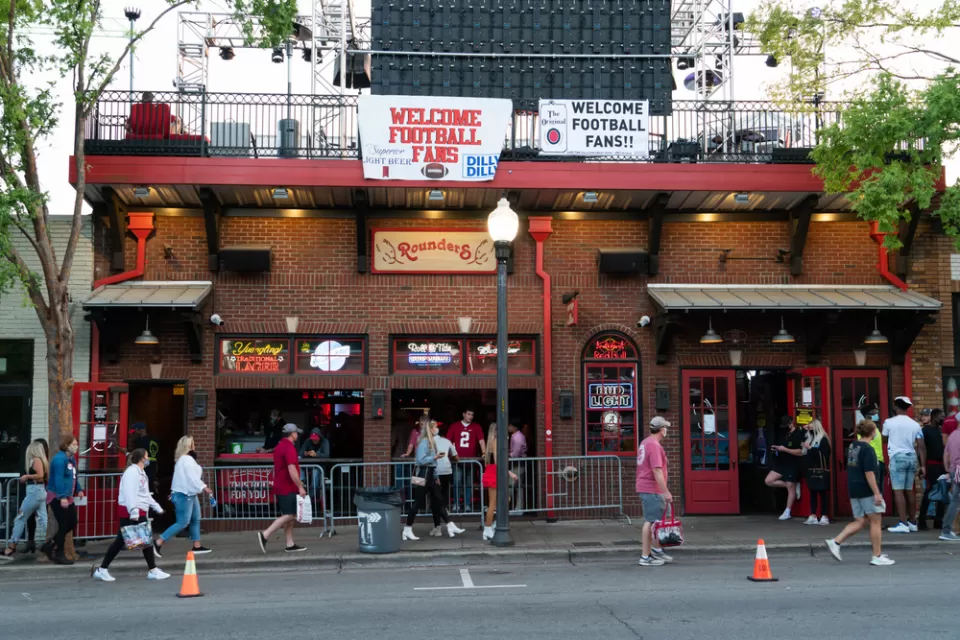 A bar is adorned in festive decorations for a college football game in Tuscaloosa, Alabama.